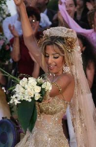 Dana Halabi : dana dancing at her movie clip wearing a wedding dress