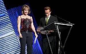 Cory Everson : Corey Everson on stage Lifetime Achievement Award with  Arnold Schwarzenegger