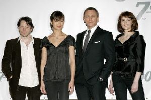 Olga Kurylenko : Olga Kurylenko with Mathieu Amalric, Daniel Craig, and Gemma Arterton