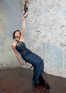 Olga Kurylenko : hanging from the ceiling