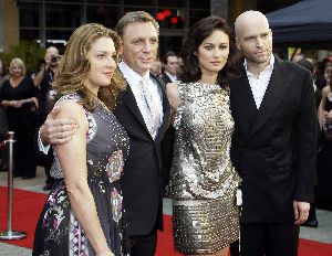 Olga Kurylenko : Olga Kurylenko at the Australian premier of Quantum of Solace in Sydney with the director Marc Forster and co-star Daniel Craig