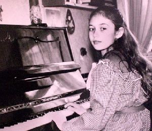 Olga Kurylenko : Old photo of Olga Kurylenko when she was a young girl of 13 years old