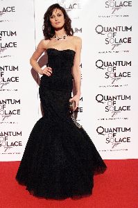 Olga Kurylenko : Olga Kurylenko wearing an elegant black cocktail dress for the Quantum of Solace premiere in Rome