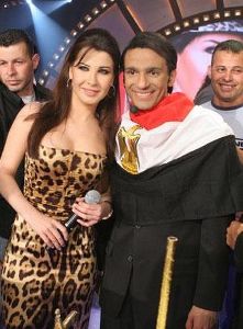 Nancy Ajram : nancy with the winner of abd elhalim contest who is from egypt