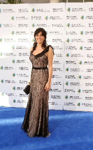 Nadine Labaki : director and actor in the film caramel on the blue carpet