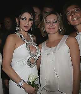 Haifa Wehbe : Haifa Wehbe picture with a fan at the 2008 Reviera Concert