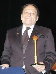 Adel Emam : on stage with an honory award