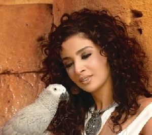 Hanan Turk : hanan turk curly hair picture with a parrot