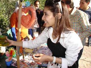 Hanan Turk : hanan turk at a  small street shop