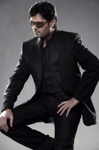 Ragheb Alama : black suit and sunglasses