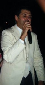 Ragheb Alama : looking stylish in a white suit