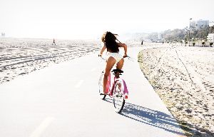 Tila Tequila : poster of tila riding a bike