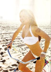 Tila Tequila : white bikini on the bike