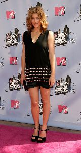 Jessica Biel : jessica biel new photos wearing a small black dress with metal accents at the mtv awards 2008