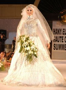 Hanan Turk : Hanan at a fashion show wearing a wedding bridal dress with a scarf