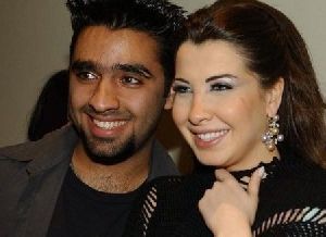 Nancy Ajram : Nancy photo with a fan in Belgium