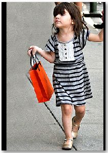 Suri Cruise : walking down the street in her Navy Striped Dress