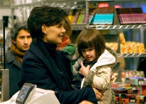 Suri Cruise : Katie Holmes takes daughter Suri out shopping and sightseeing in New York City, visiting Rockefeller center to see the ice skating and Christmas lights