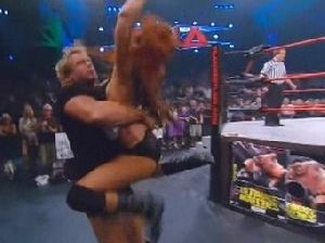 Christy Hemme held by a wrestler