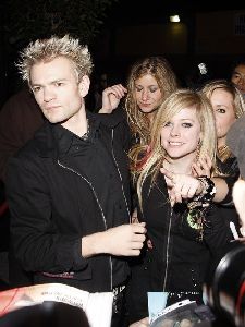 Avril Lavigne accompanied by her husband Deryck Whibley leaving Bar Deluxe in Los Angeles, California