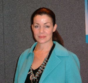 Claudia Christian : Claudia Christian in a light blue double chest coat