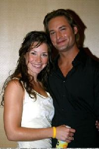 Josh Holloway : at a premiere hugging his co-star friend Evangeline Lilly, Josh looks awkward with a clean shave without his beard