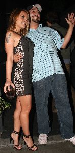 Tila Tequila : photographed with a fan outside STK Restaurant in Los Angeles on October 31, 2008