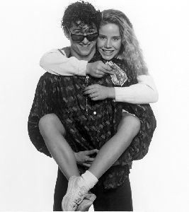 Amanda Peterson : a large photo hugging actor Patrick Dempsey