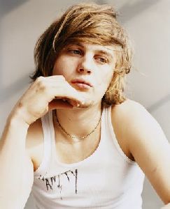 Michael Pitt : a studio photo shoot wearing a white Undershirt