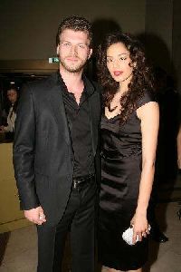 Kivanc Tatlitug and Azra Akin both on a red carpet looking glam in black outfits