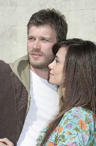 Kivanc Tatlitug with songul oden (Noor) cheering the audience