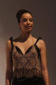 Azra Akin on a fashion show runway