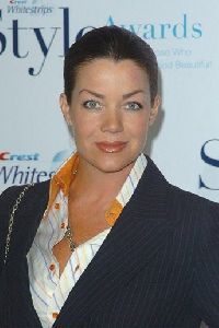 Claudia Christian looking formal at a public gathering