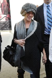 pink : wearing a large gray textured hat as she leaves the Alexander McQueen store in New York City, October 2008