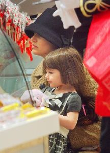 Suri Cruise accompanied by her mom