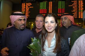 Nancy Ajram arriving with JeeJee lamara her manager