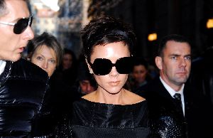 VICTORIA BECKHAM : arriving at Dolce and Gabbana s shop in Milan on December 2008