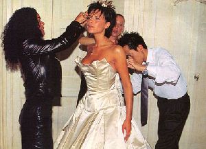 VICTORIA BECKHAM : wearing her wedding dress