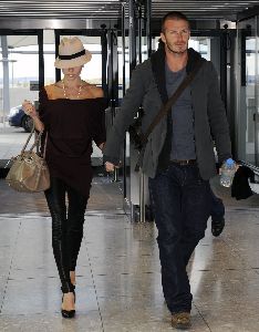 VICTORIA BECKHAM : and David Beckham at Londons Heathrow Airport on October 18th, 2008