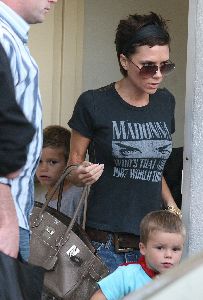 VICTORIA BECKHAM and her sons