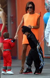 VICTORIA BECKHAM : walking with her boys for her son s Romeo Birthday Party