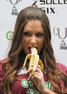 Lucy Pinder : with a banana at the annual fundraising tournament Music Industry Soccer Six at West Ham s Boleyn Ground, Upton Park on May 22, 2005