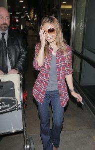 Tila Tequila : newest picture arriving at LAX airport on New Year s Day in Los Angeles, California