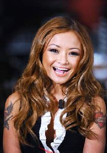 Tila Tequila wearing a white-collar black top  at CALICO`S Bar on December 8th 2008