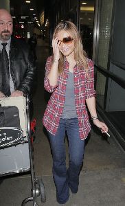 Tila Tequila : latest picture arriving at LAX airport on New Year s Day in Los Angeles, California on the 1st of January 2009