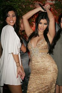 Kourtney Kardashian : with Kim who is dancing at her at her  Birthday Party At Les Deux on October 21, 2007 in Los Angeles, California