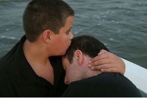 Jett Travolta kissing his dad John Travolta