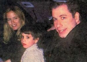 Jett Travolta accompanied by his parents Kelly Preston and John Travolta