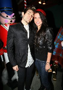 Audrina Patridge with a friend at the KROQ Almost Acoustic Christmas party