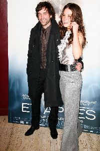 Evangeline Lilly with Romain Duris at the movie Afterwards premiere